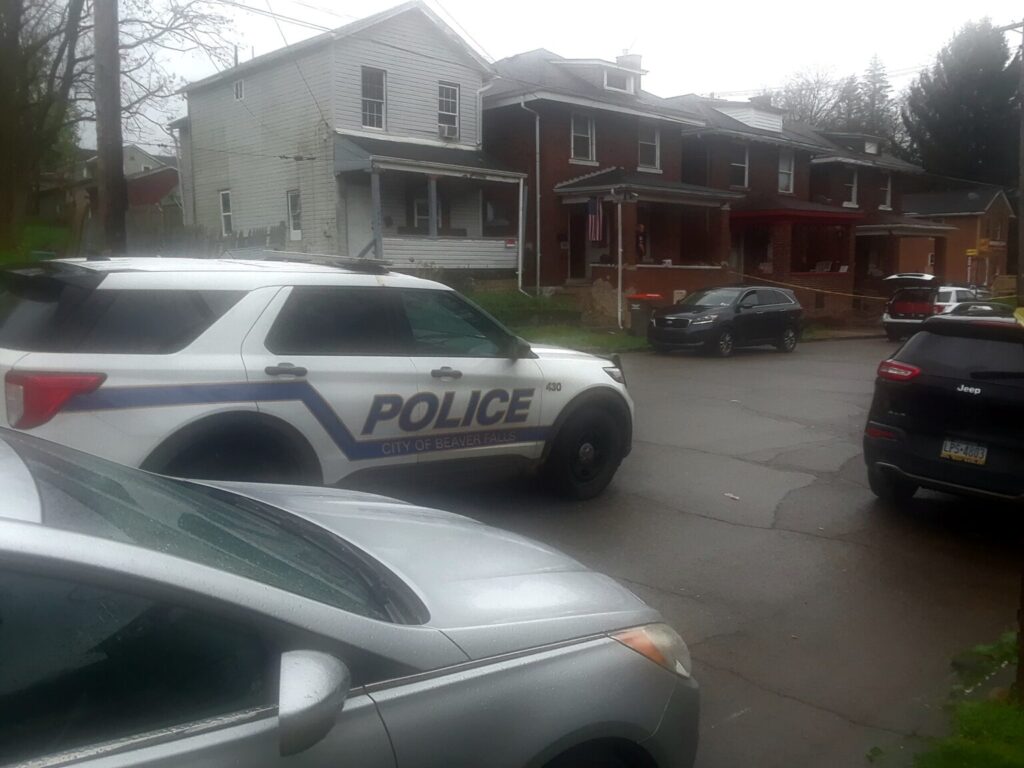 a police car in front of a house