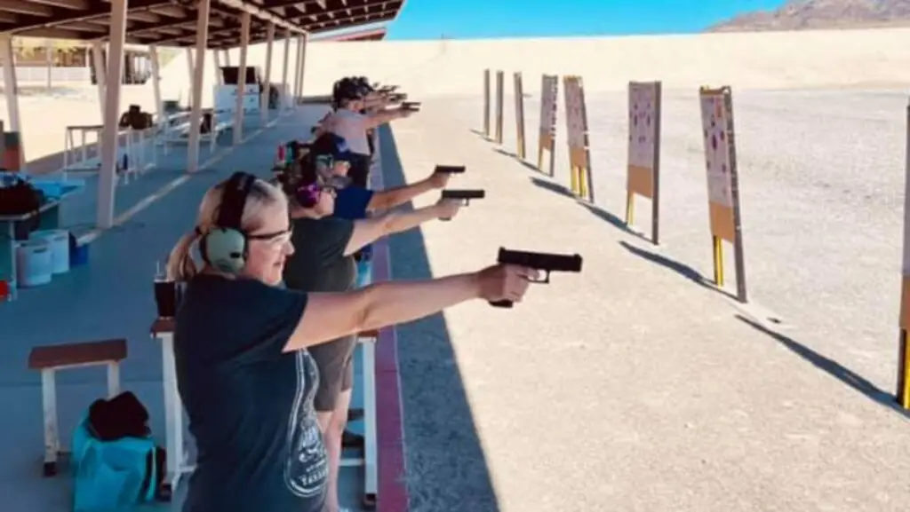 Ladies training with firearms at the range