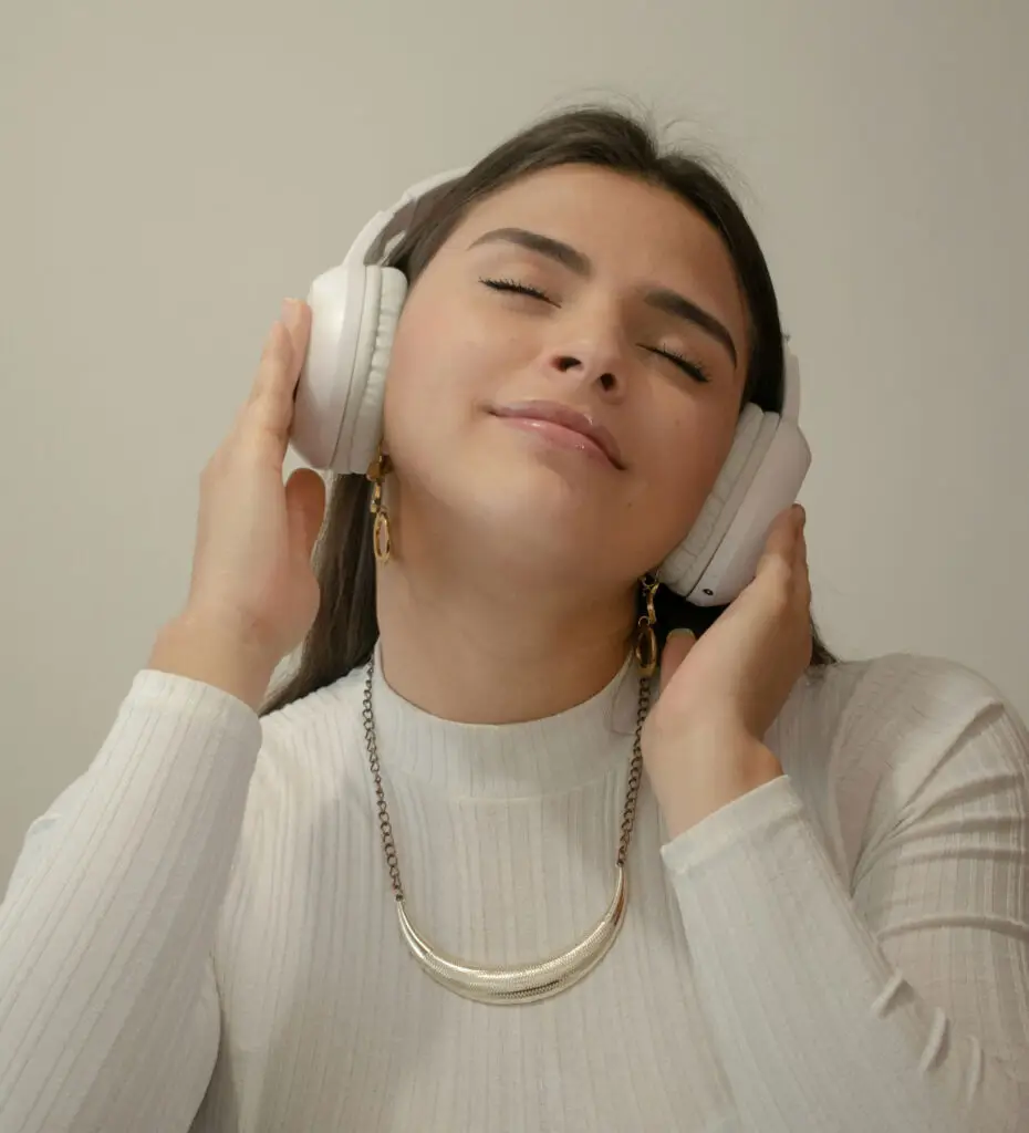 woman with headphones on listening to music