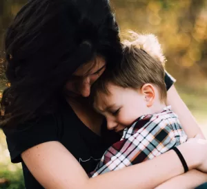 mother holding small boy