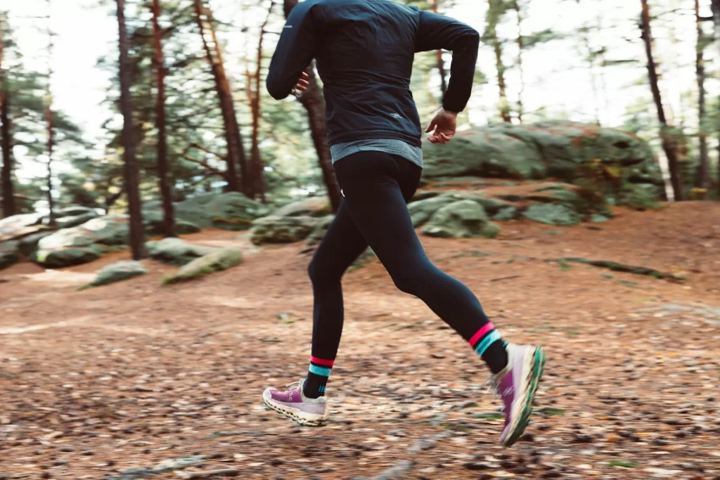 woman running on a trail