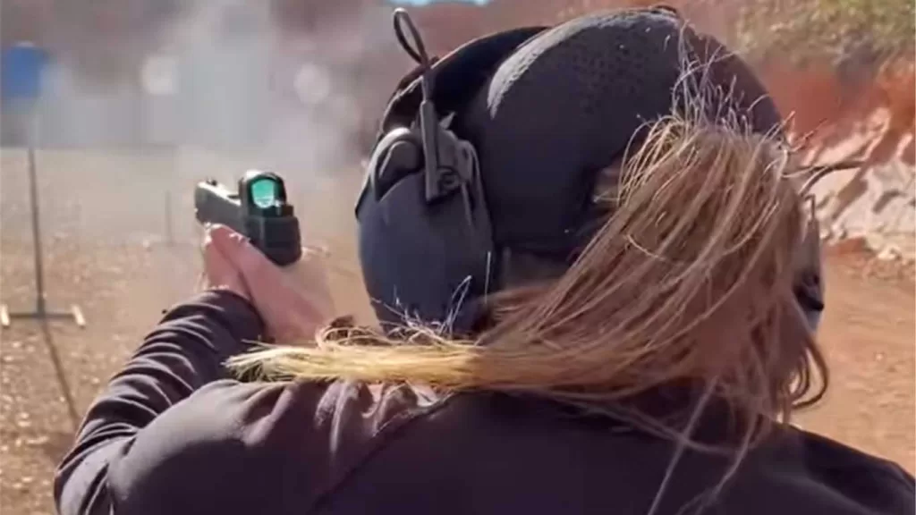 woman shooting a gun